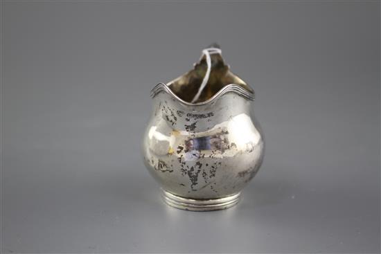 A George III silver helmet shaped cream jug, by Charles Hougham?, London, 1806, height, 85mm, 3oz.